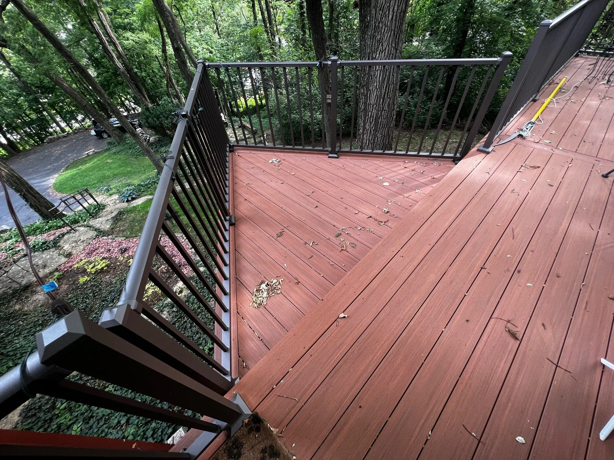 View over the deck railing to the yard below