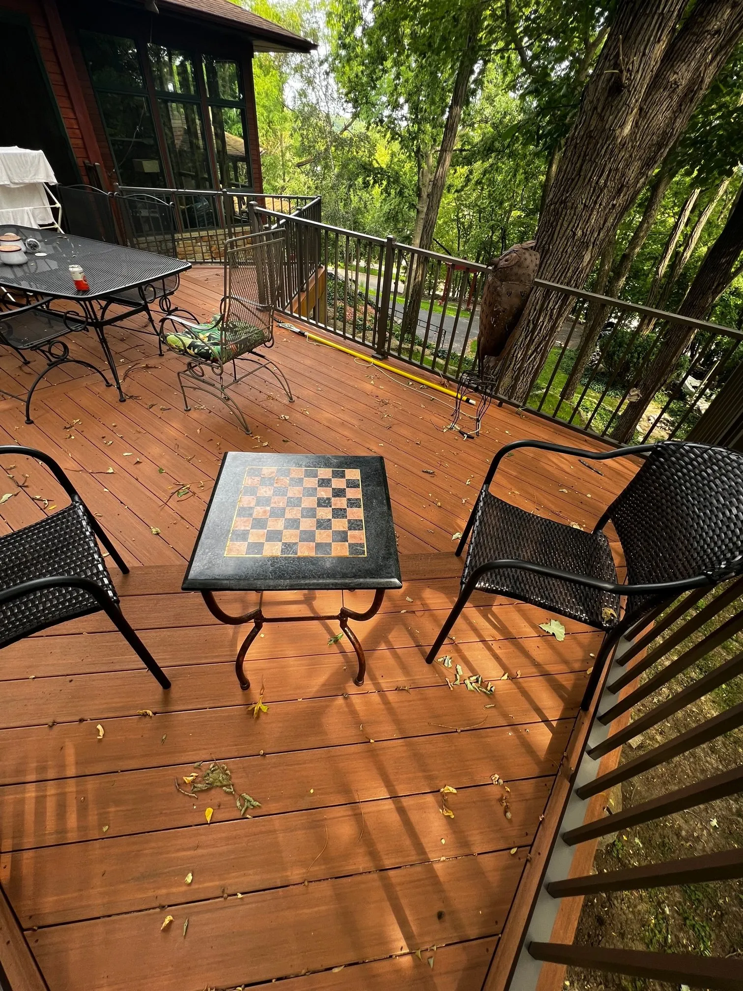 Checkerboard table and chairs on the finished deck