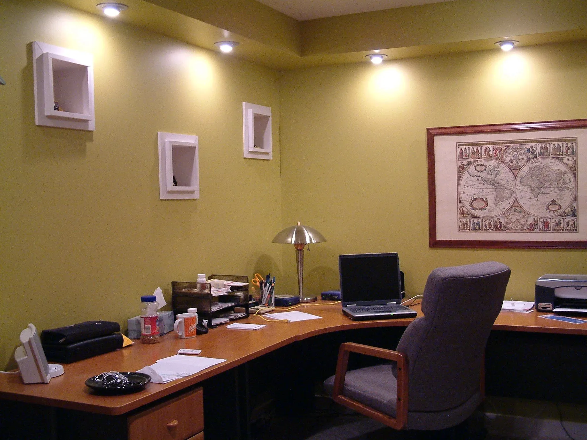 Home office with L-shaped wood desk