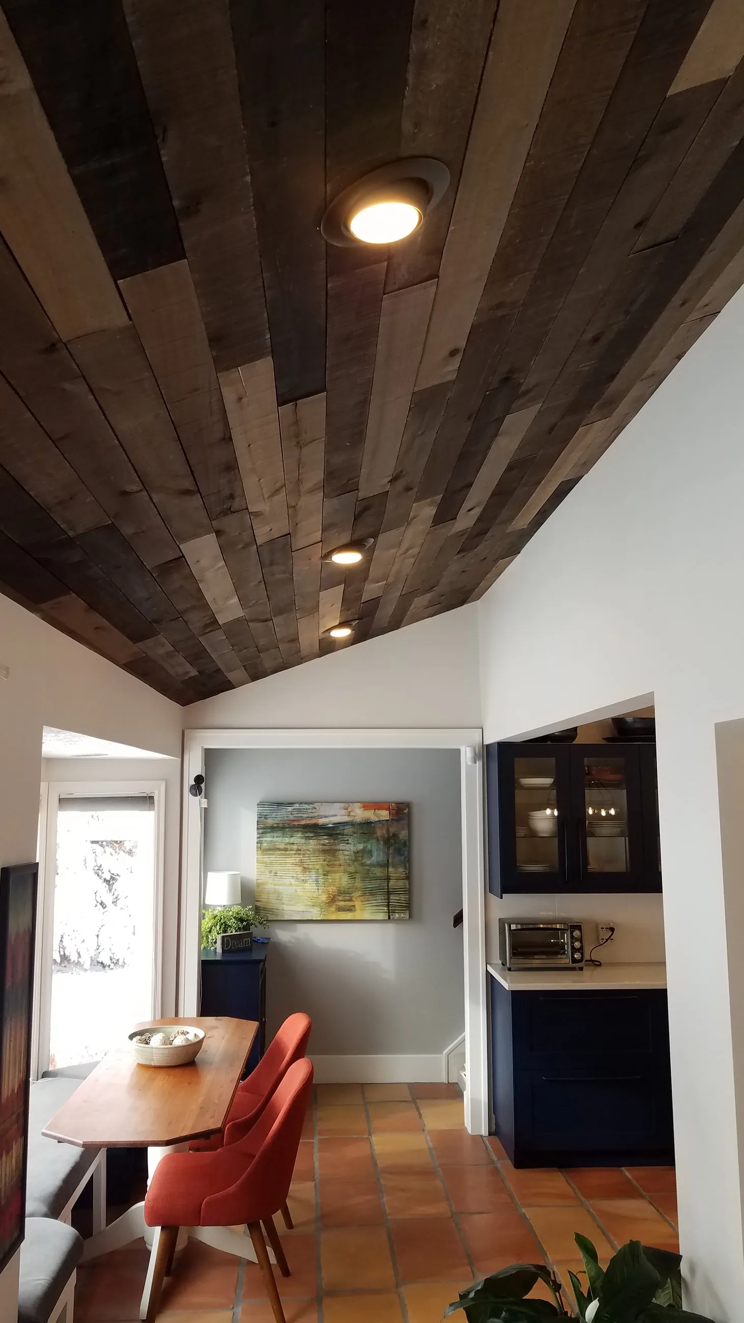 Reclaimed wood ceiling over the dining nook