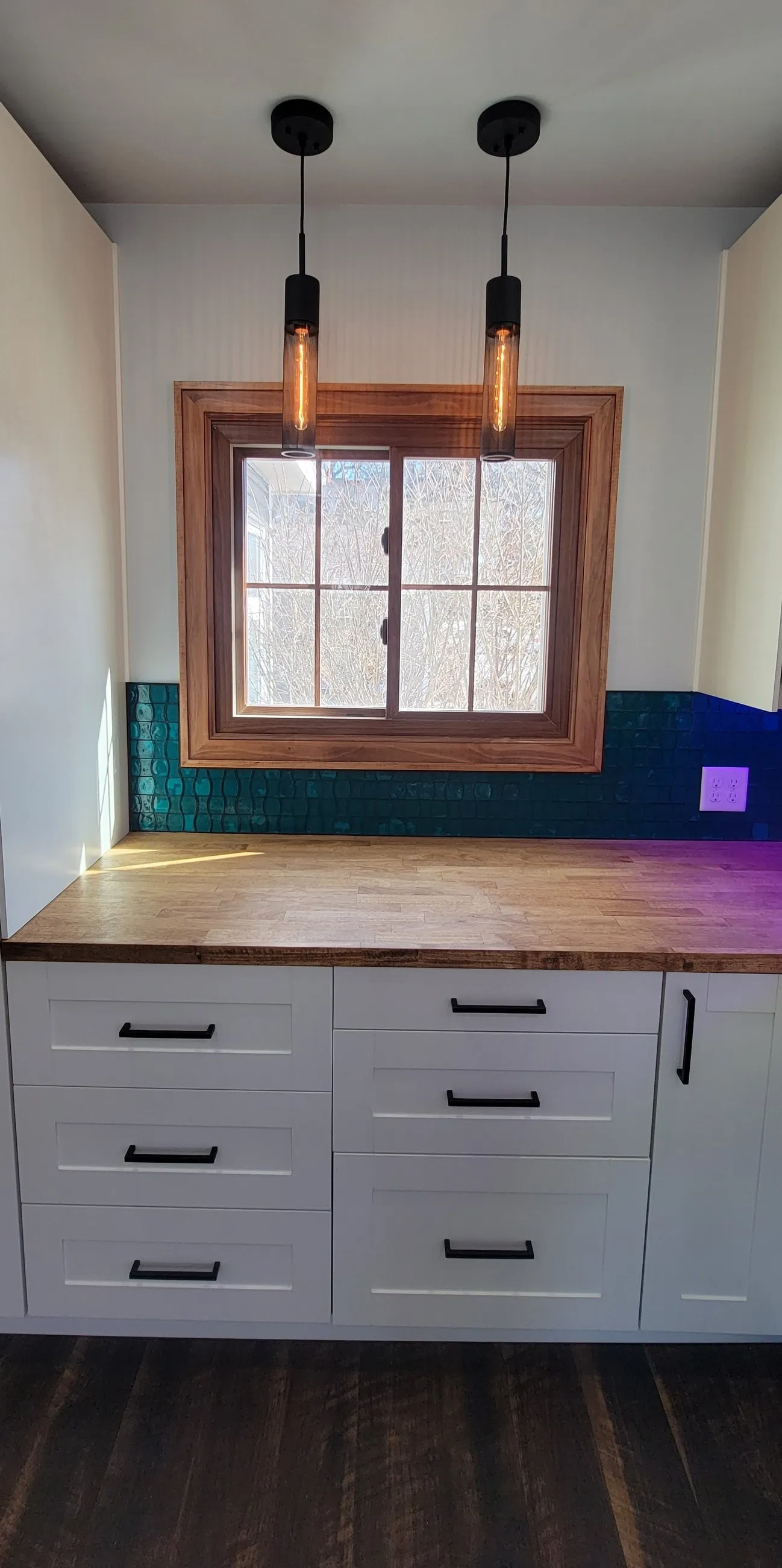 Coffee counter under twin pendants by the window