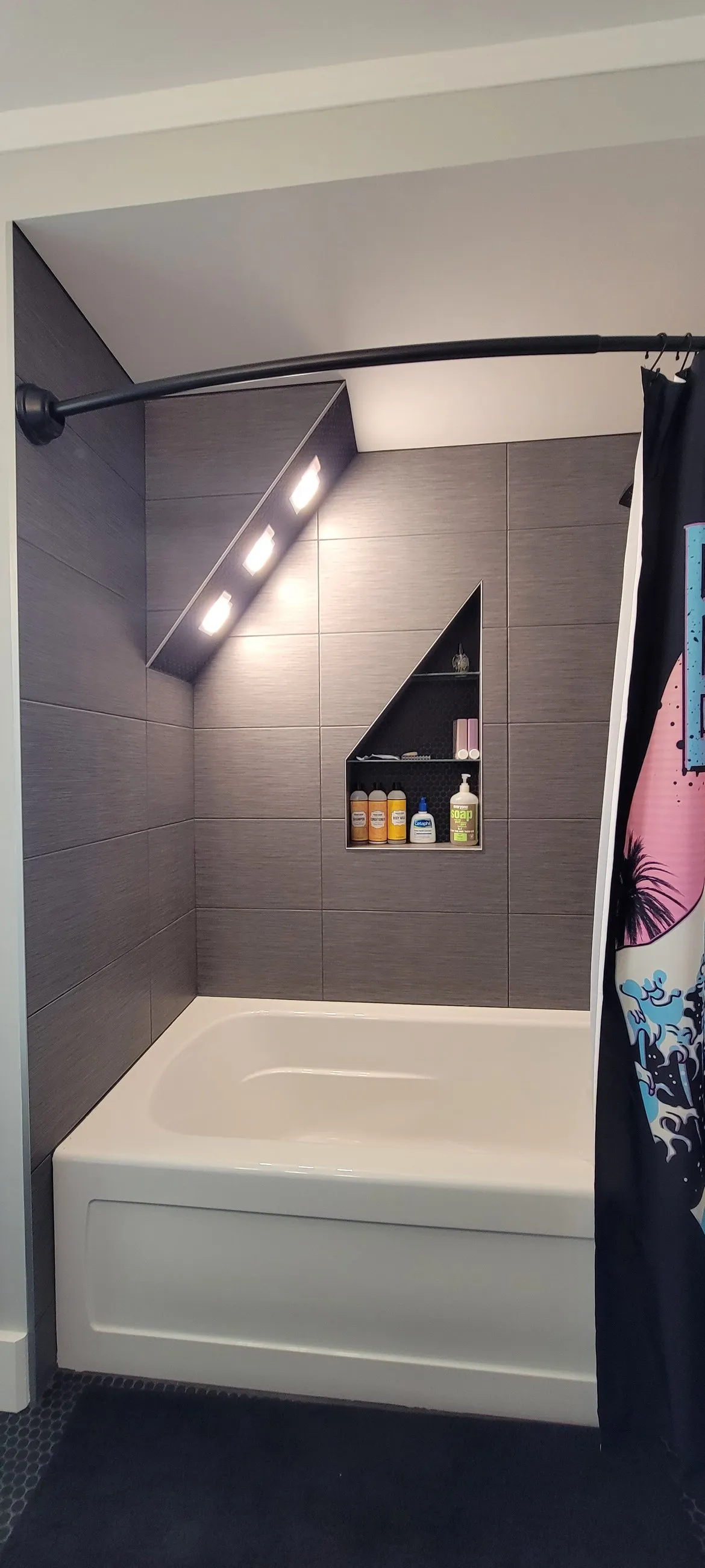 Sloped shower ceiling following the roofline