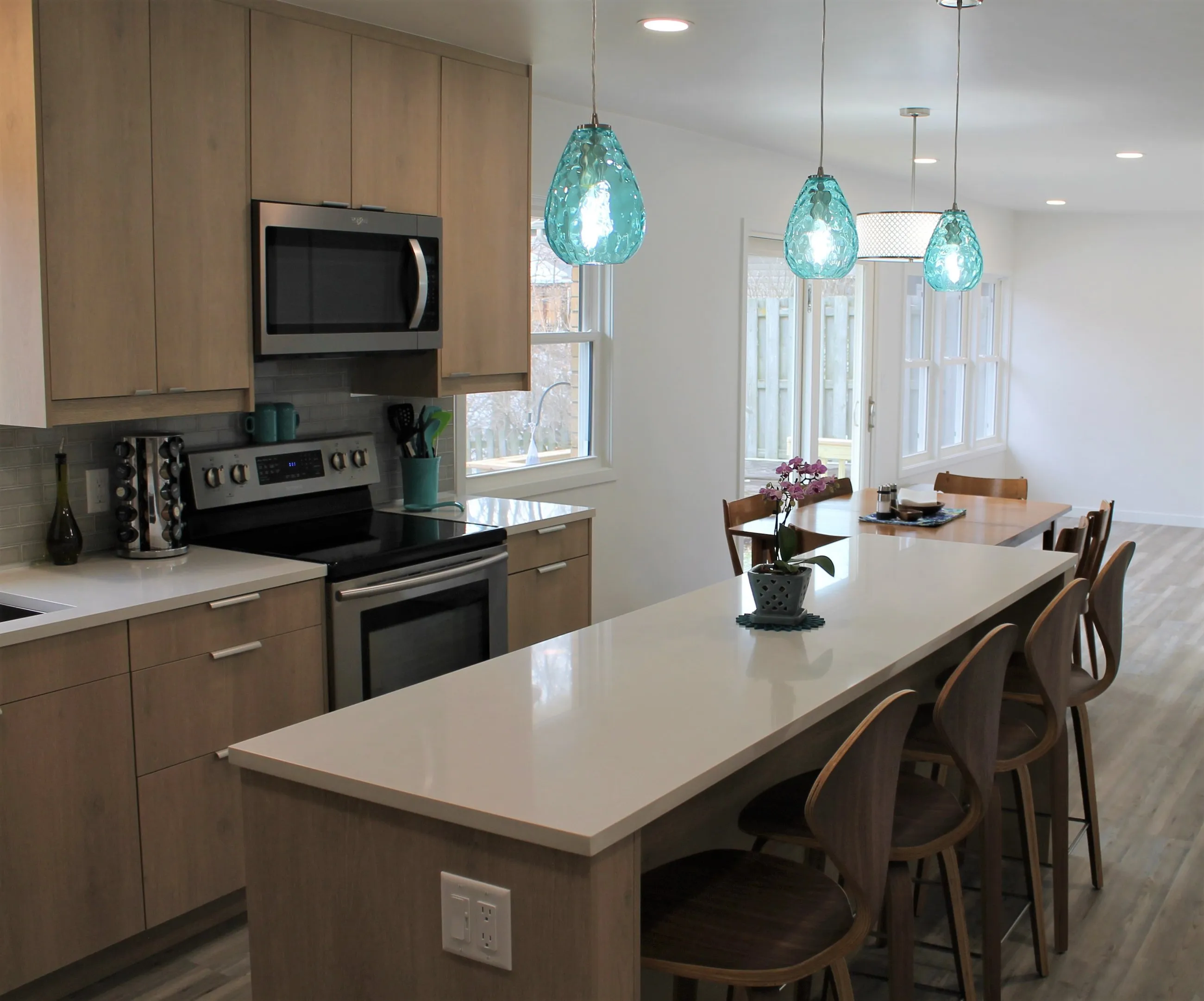 Long white quartz island with seating