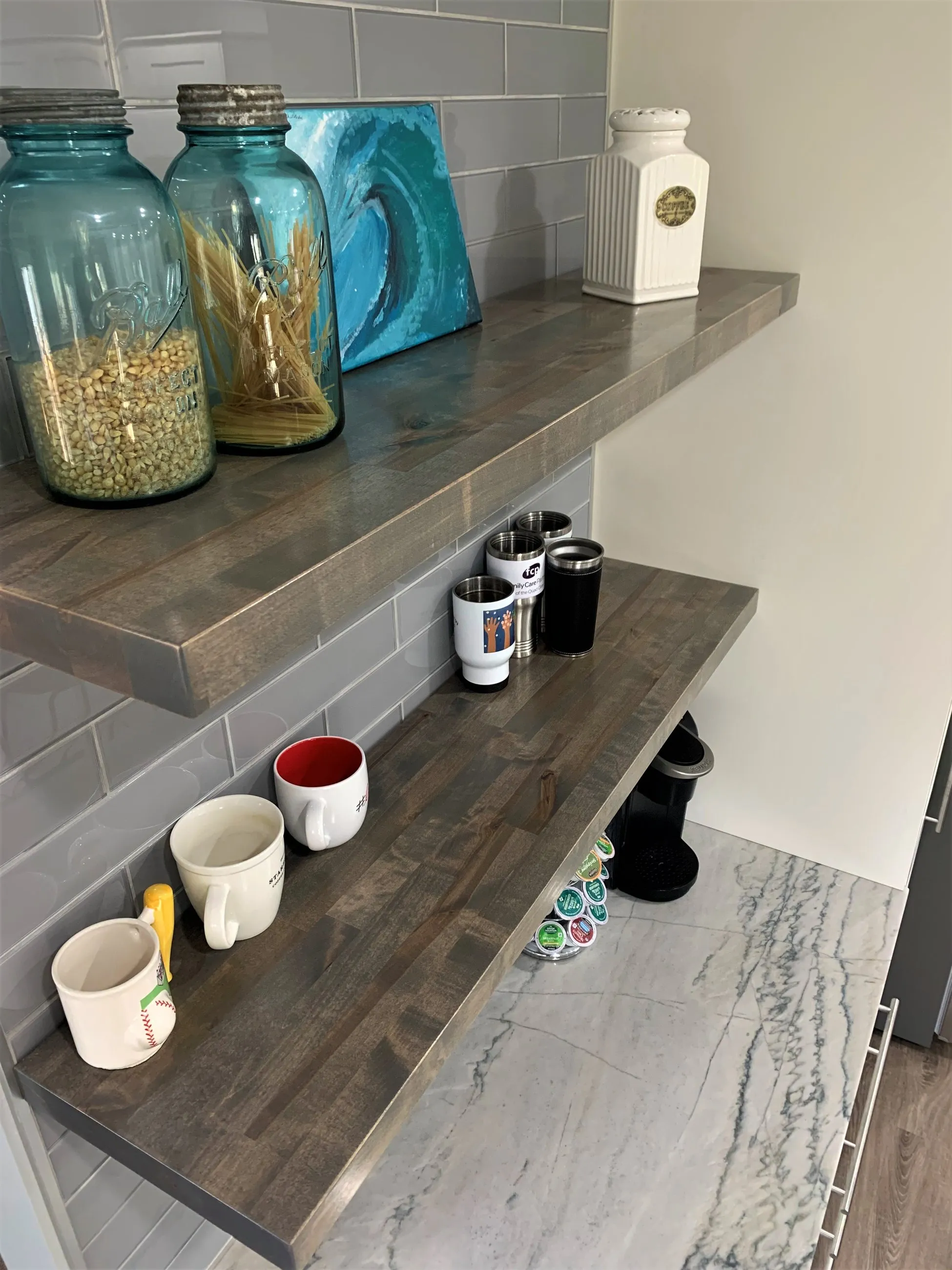 Wood floating shelves over the coffee bar