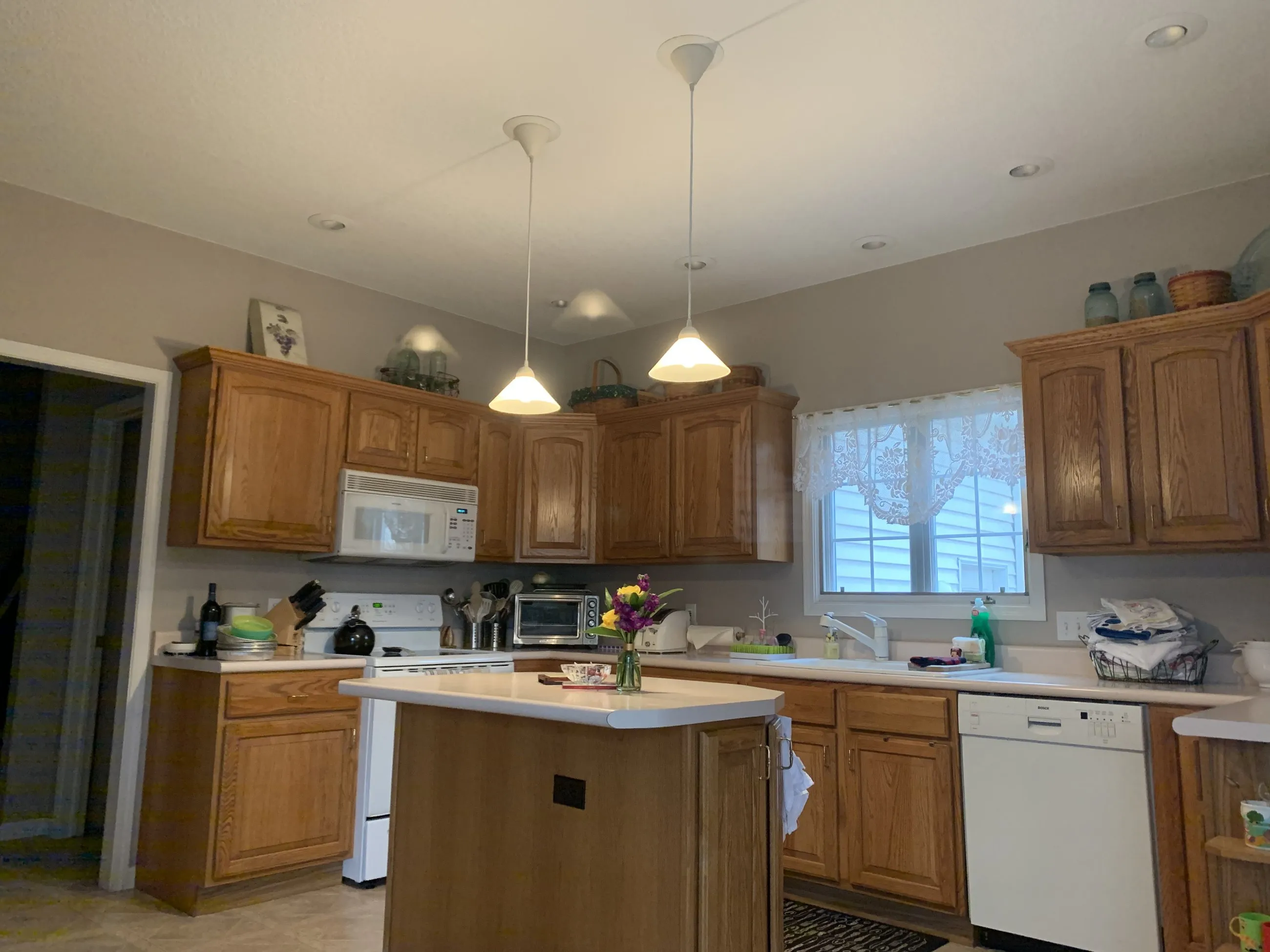 The kitchen before the remodel, with oak cabinets