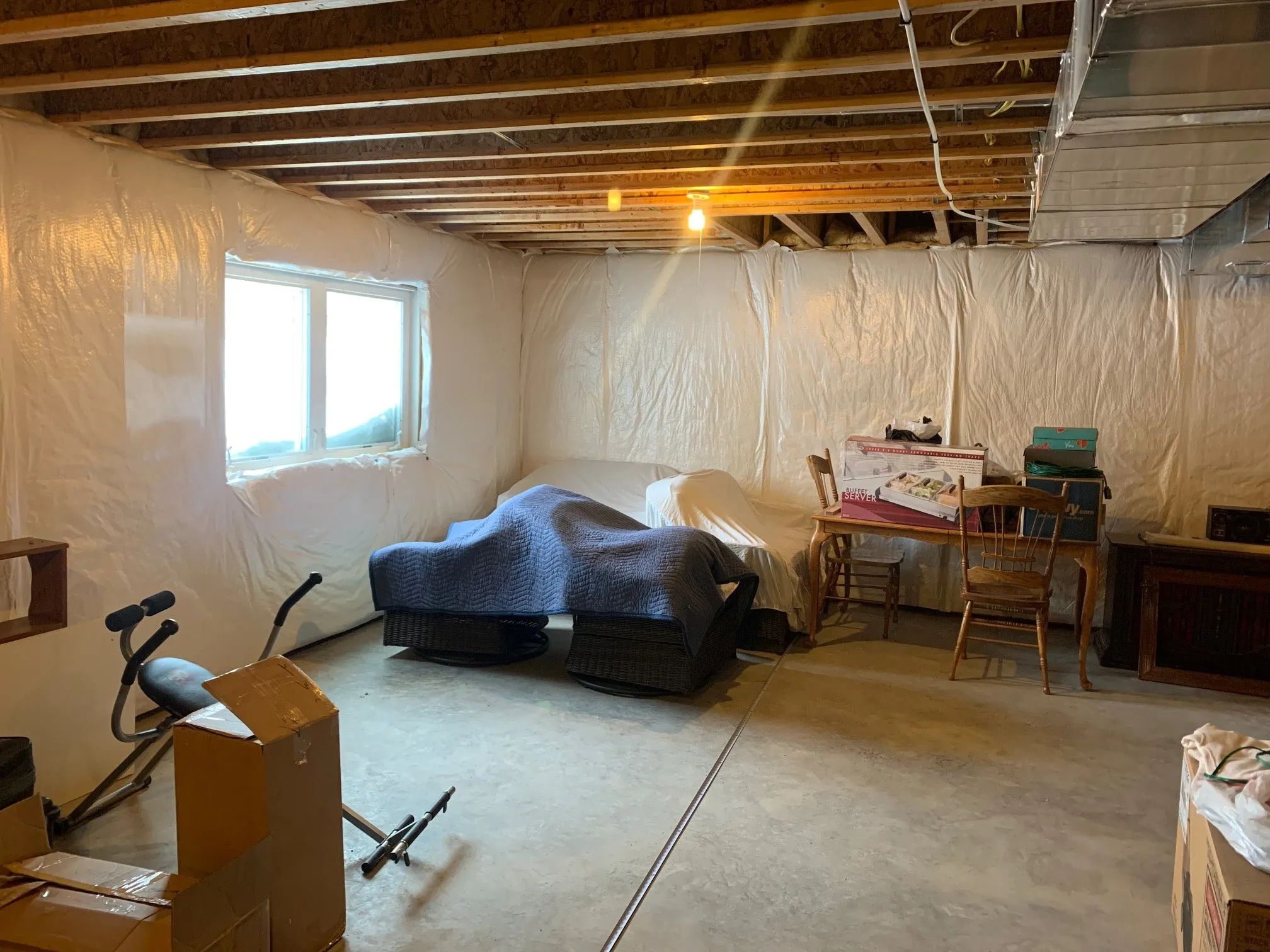 The unfinished basement before the remodel