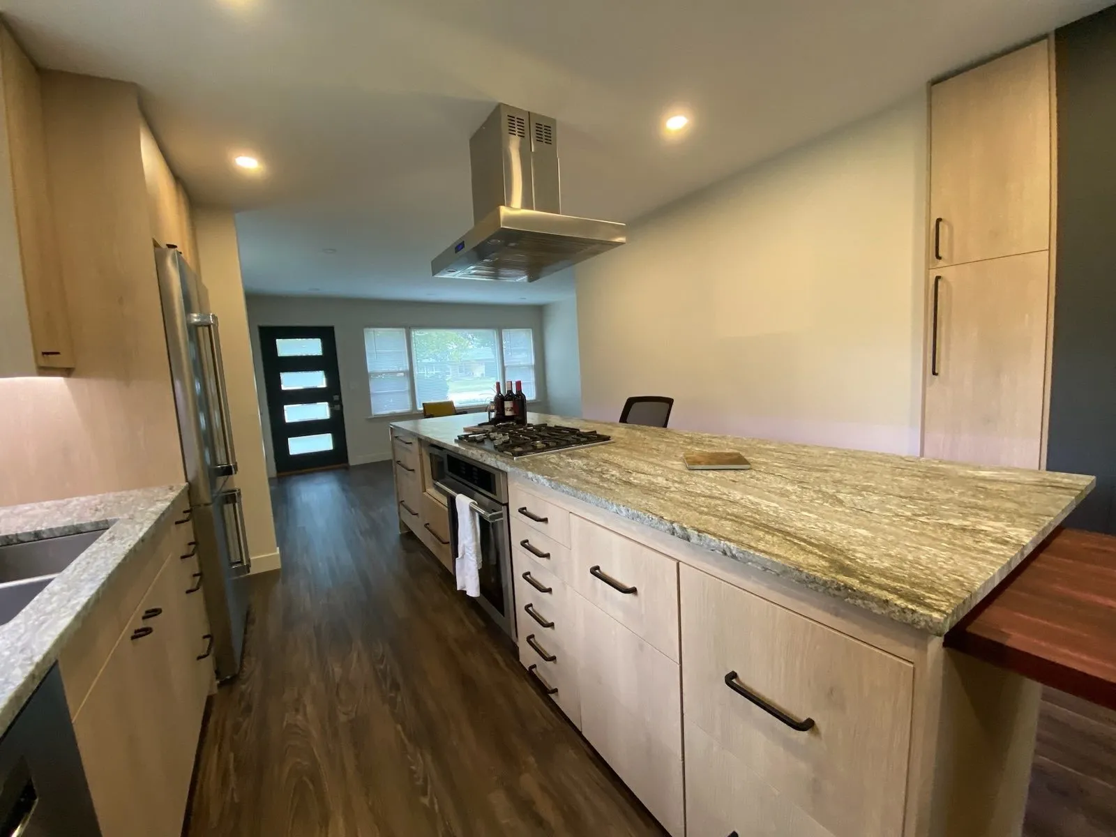Granite counter running the length of the kitchen